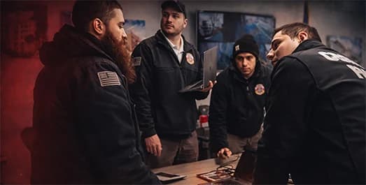 FDNY violation removal discussion with a County Fire specialist
